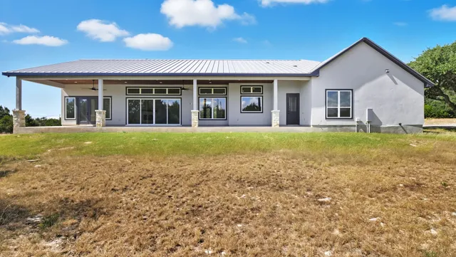 a view of a house with a garden