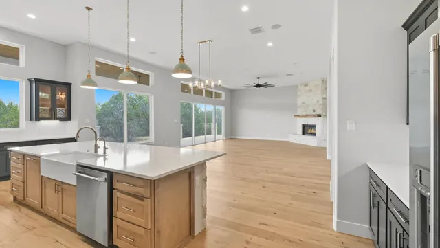 a bathroom with a sink double vanity and a shower