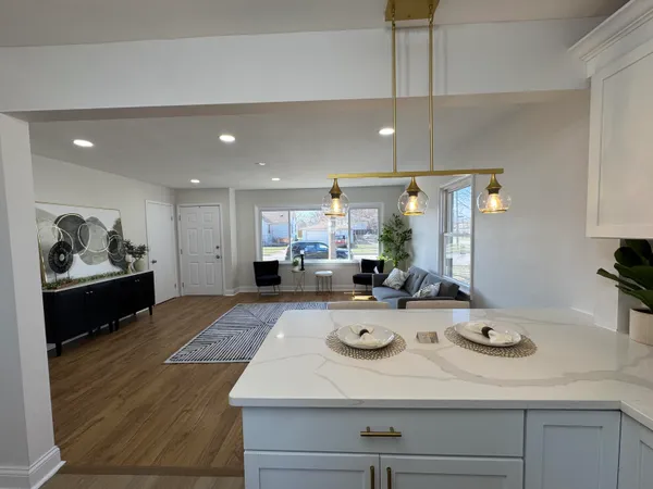 a kitchen with sink and stove