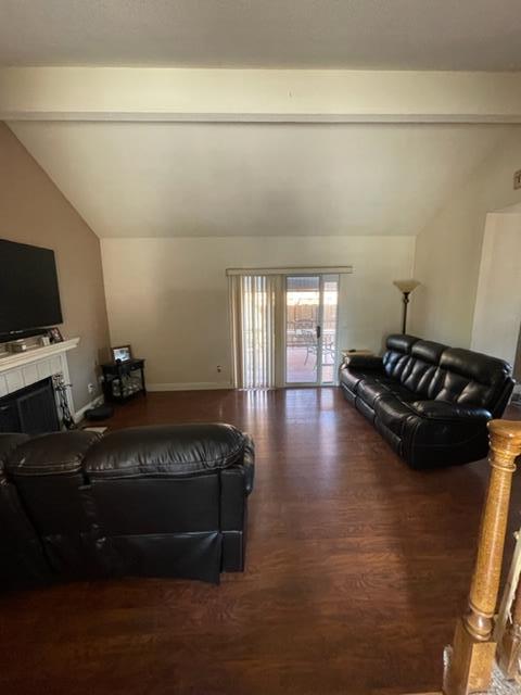 7691 Church Street, Unit B Gilroy, CA 95020 - Photo 2 of 9 a living room with furniture and a flat screen tv