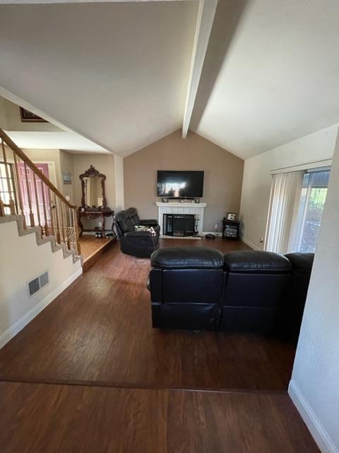 7691 Church Street, Unit B Gilroy, CA 95020 - Photo 3 of 9 a living room with furniture and a flat screen tv