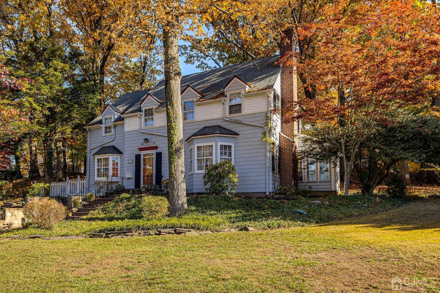 20 Edgewood Road Edison, NJ 08820 - Photo 3 of 50 a front view of house with yard and trees around