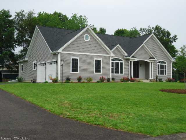 2 Aspen Ridge Somers, CT 06071 - Photo 1 of 1 a view of a house with a big yard potted plants and large tree