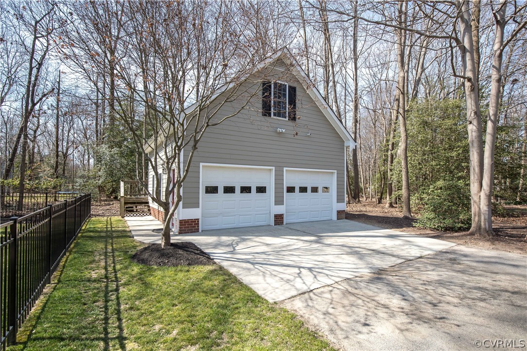 12900 Rivers Bend Road Chester, VA 23836 - Photo 29 of 32 Detached 2-car garage with a finished, heated/cool