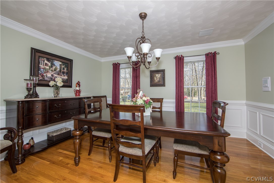 12900 Rivers Bend Road Chester, VA 23836 - Photo 3 of 32 Formal dining room. Notice the crown molding, chai