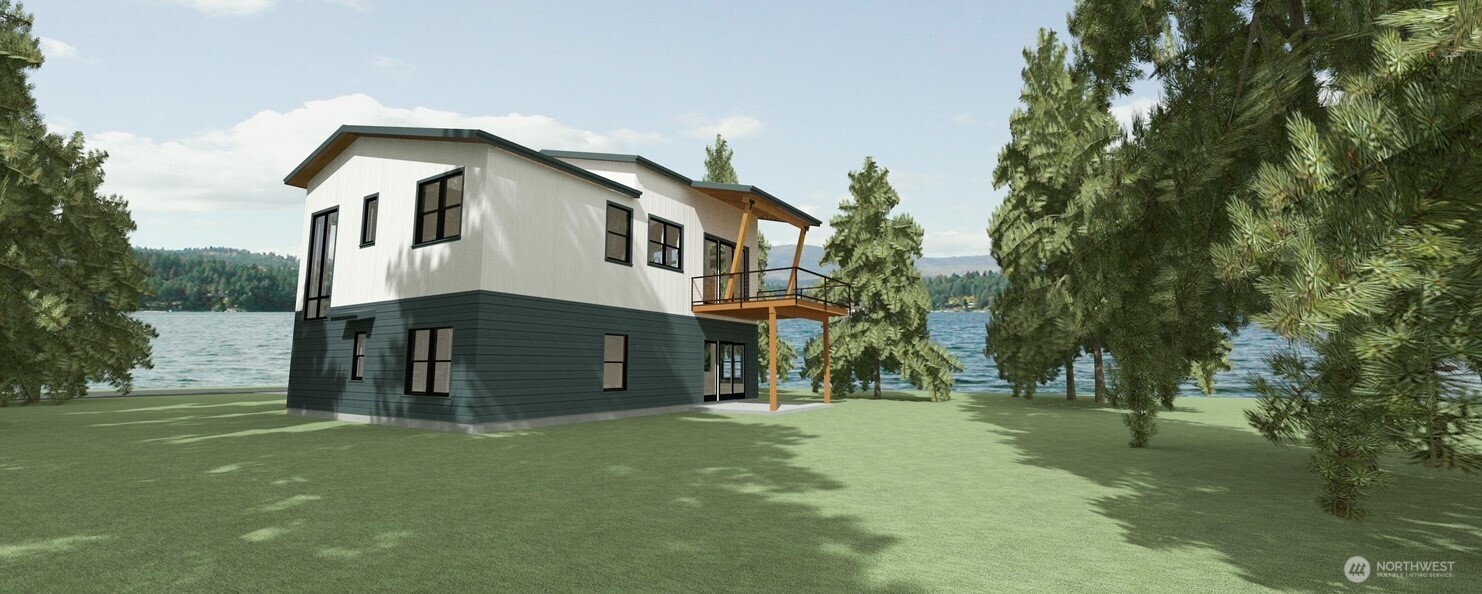 192 Donegal Drive Point Roberts, WA 98281 - Photo 15 of 35 a view of a white house with a big yard and large trees