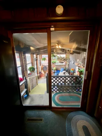 a view of a room with water heater refrigerator