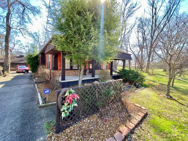 a view of backyard with green space