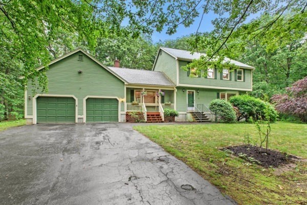 7 Ohio Road Tyngsboro, MA 01879 - Photo 2 of 35 front view of a house with a yard
