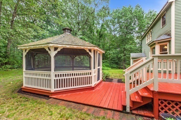 7 Ohio Road Tyngsboro, MA 01879 - Photo 21 of 35 a backyard of a house with deck and outdoor seating