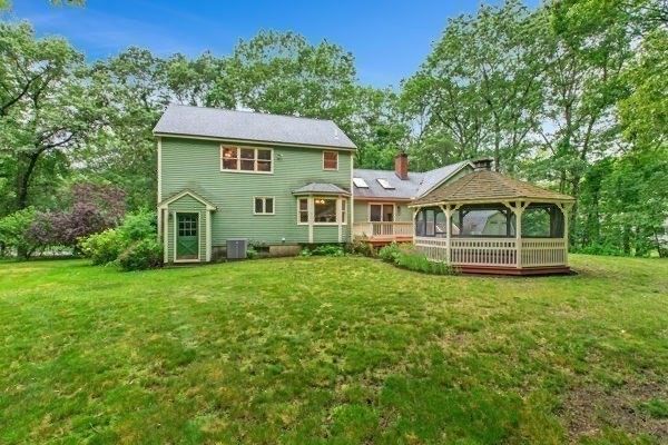 7 Ohio Road Tyngsboro, MA 01879 - Photo 29 of 35 a view of a house with a garden