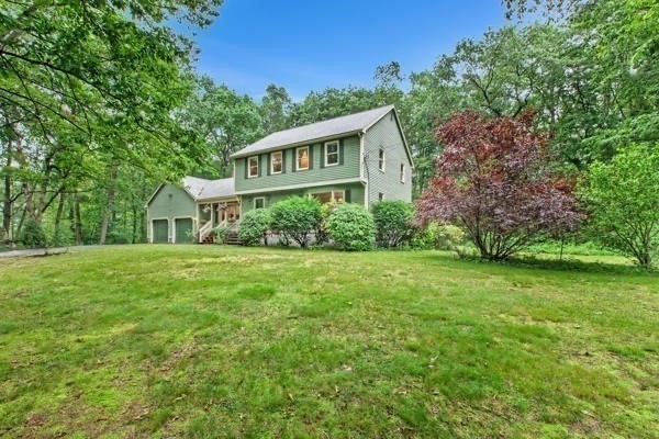 7 Ohio Road Tyngsboro, MA 01879 - Photo 30 of 35 a front view of a house with a yard