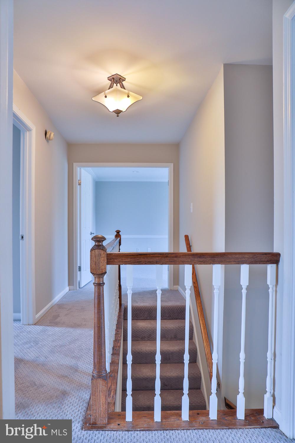 5423 Rilian Court Burke, VA 22015 - Photo 39 of 67 Bright and inviting upper hallway.