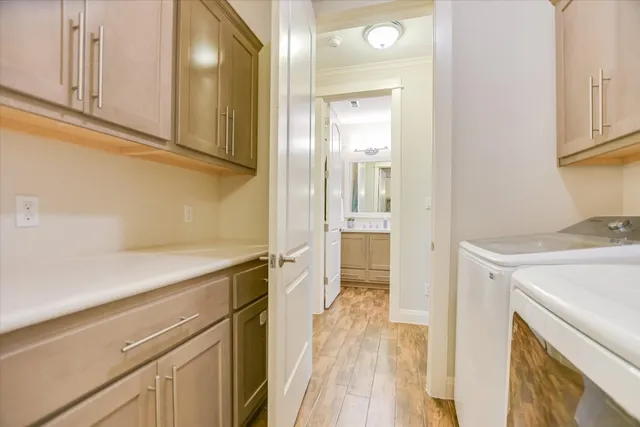 a kitchen with a sink and refrigerator