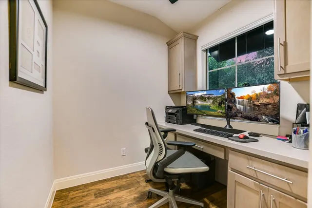 a view of a workspace with furniture