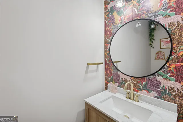a mirror with a sink and a mirror