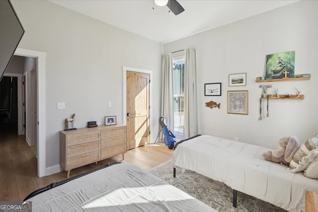 a bedroom with a bed and a couch