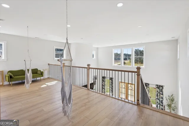 a view of a living room and workspace