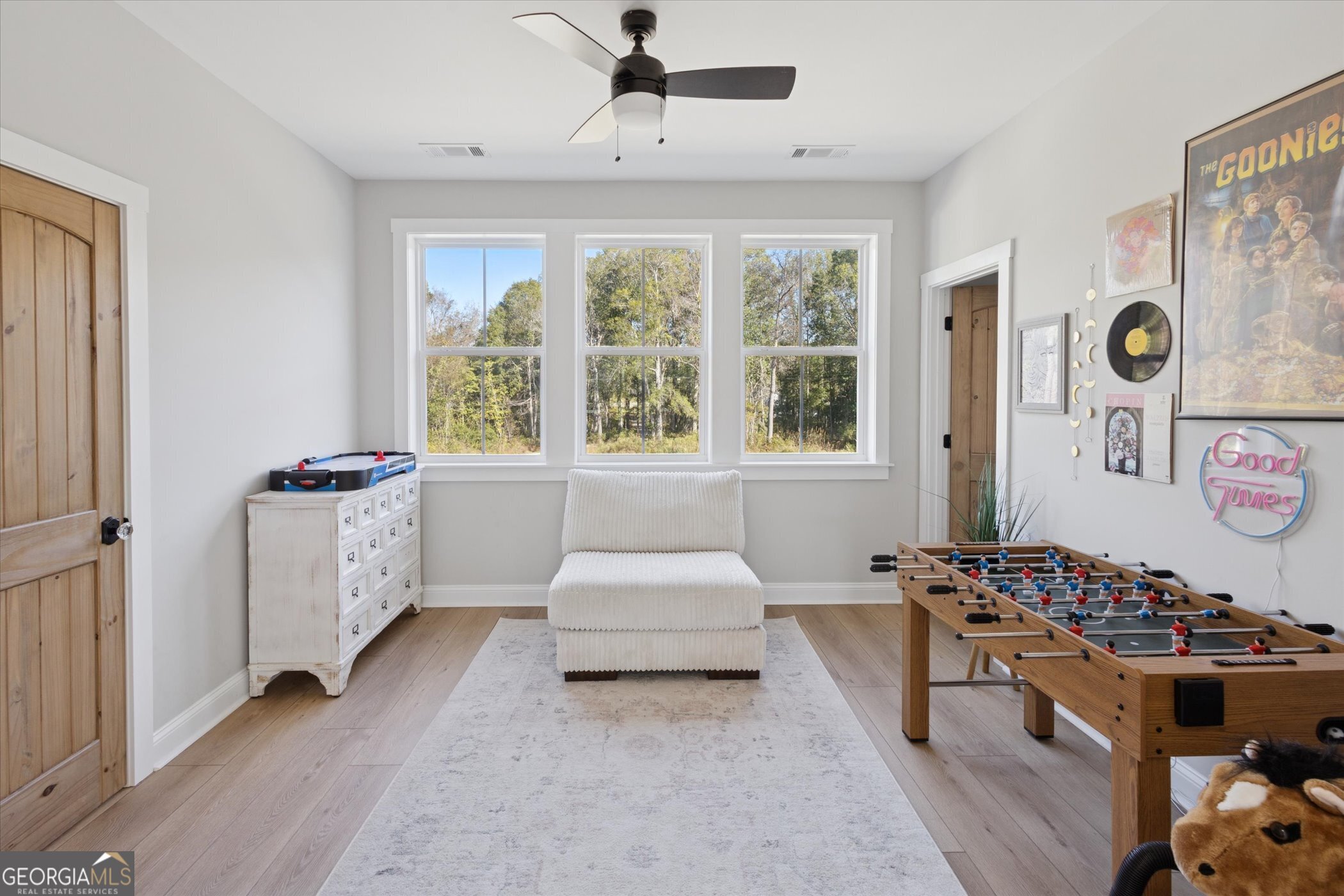 4031 Mud Road Brooklet, GA 30415 - Photo 40 of 49 a living room with a bed furniture and a window