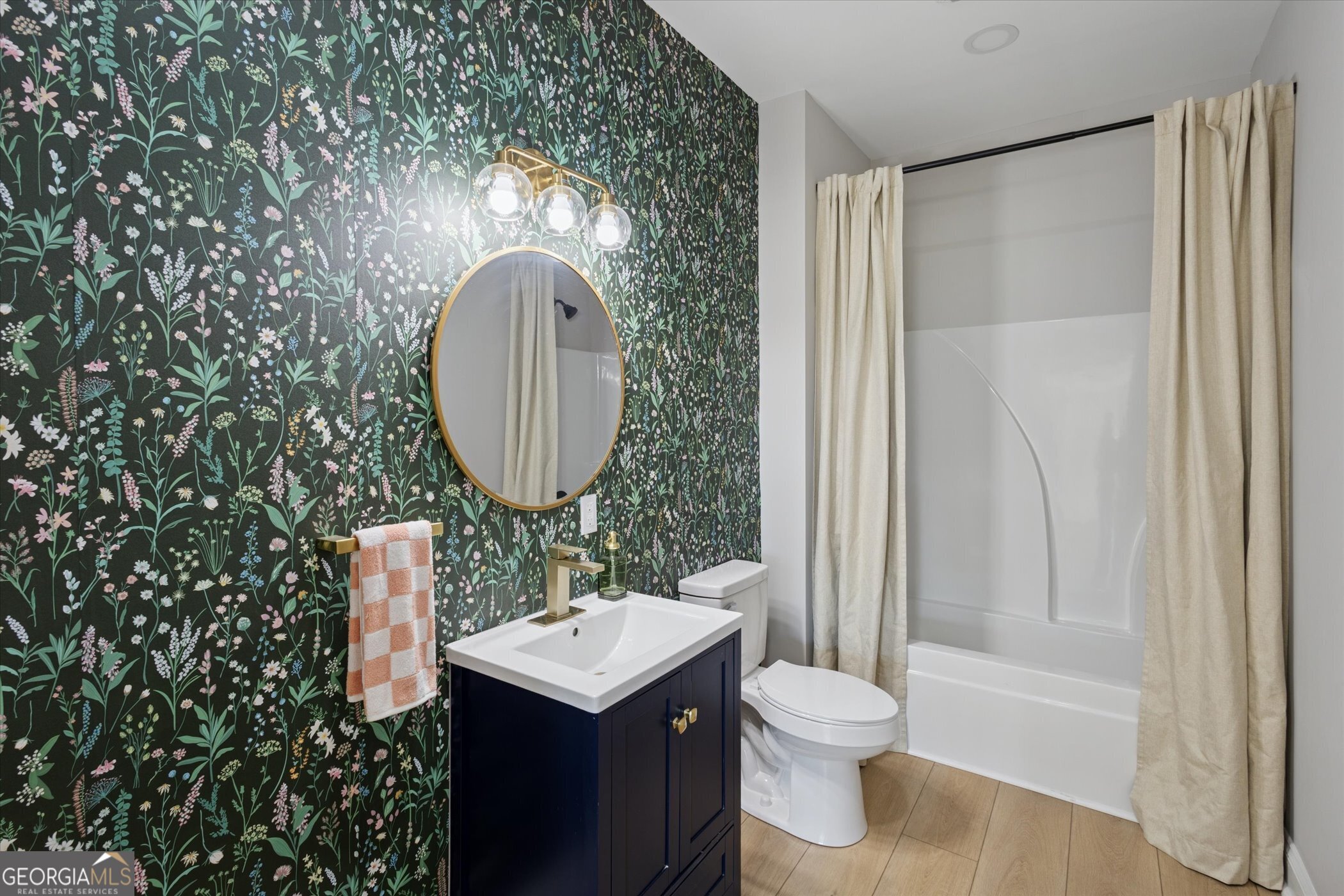 4031 Mud Road Brooklet, GA 30415 - Photo 42 of 49 a bathroom with a sink toilet and shower