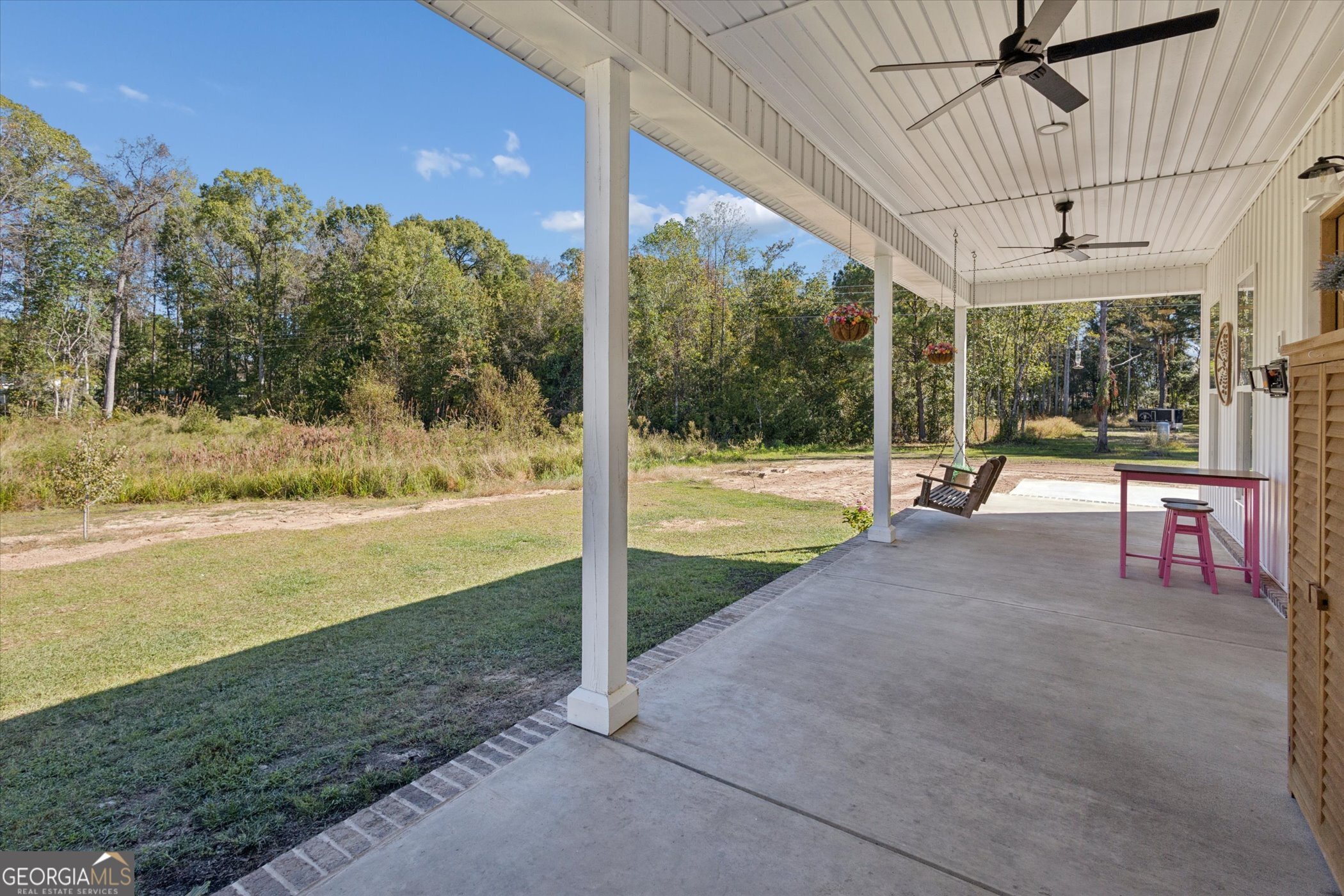 4031 Mud Road Brooklet, GA 30415 - Photo 43 of 49 a view of a swimming pool with a patio