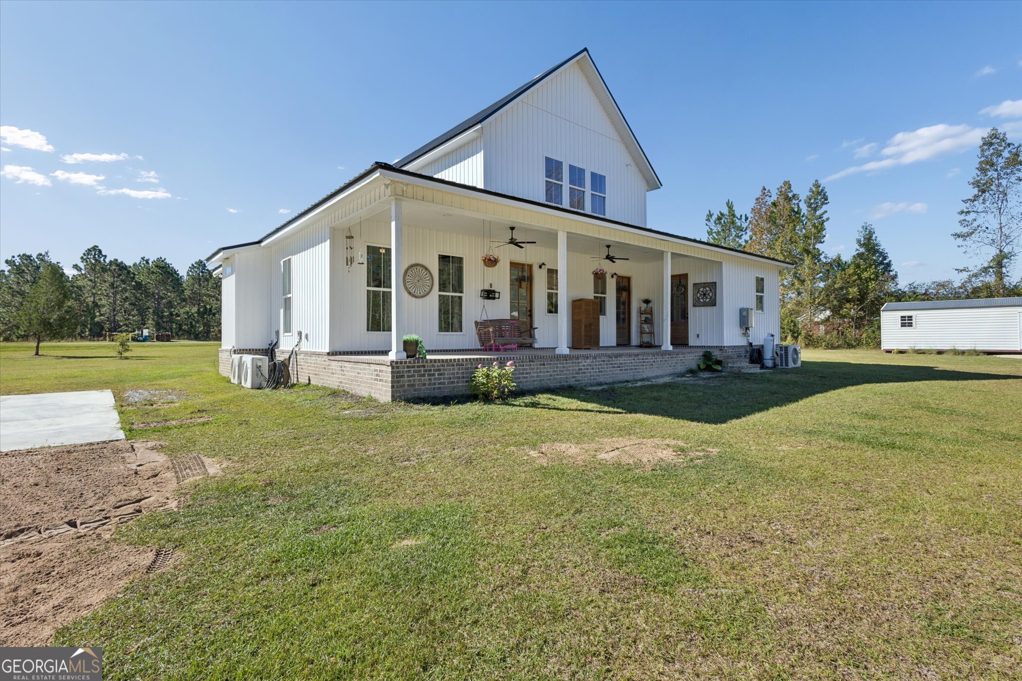 4031 Mud Road Brooklet, GA 30415 - Photo 46 of 49 a front view of house with yard and green space