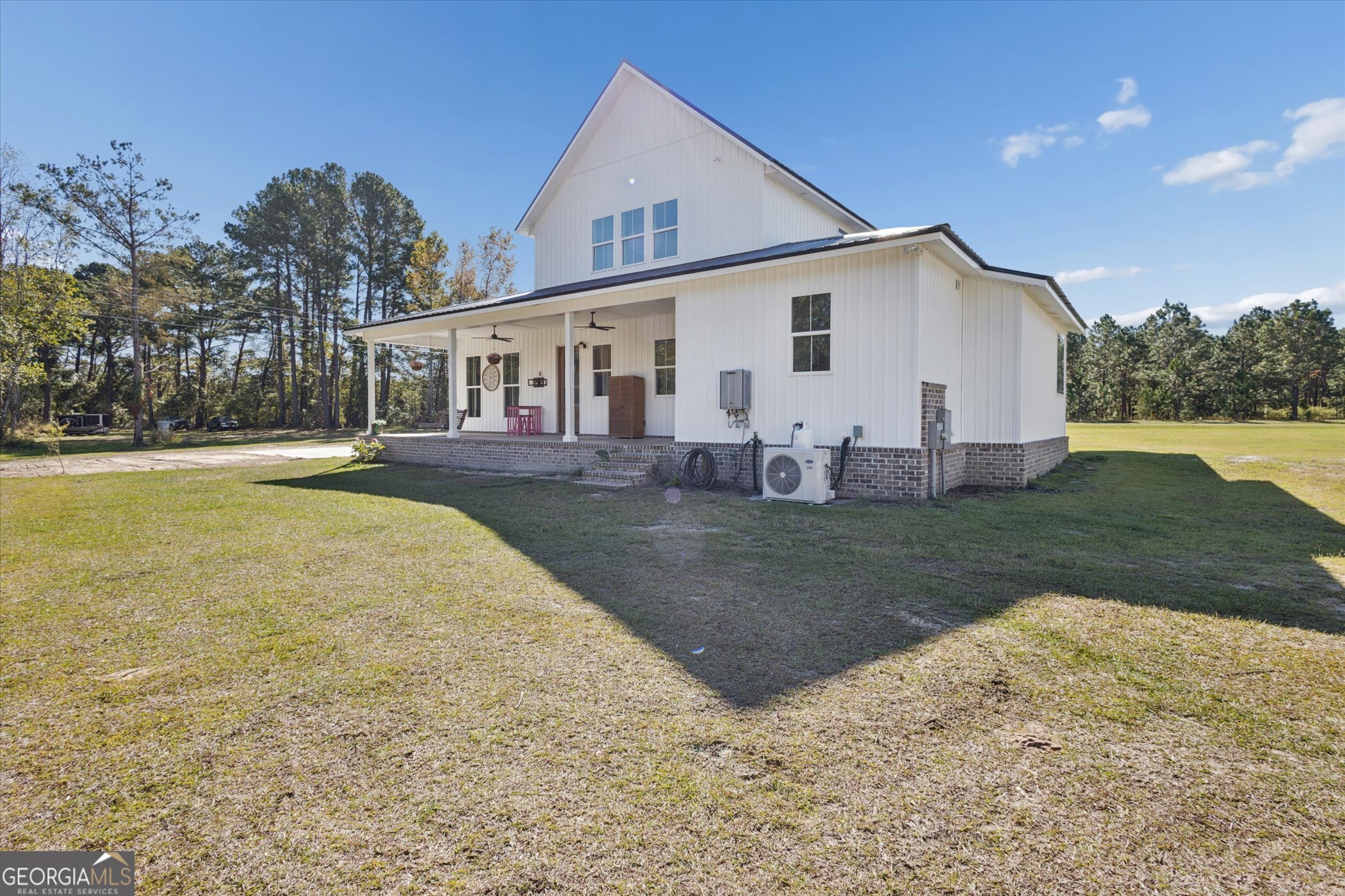 4031 Mud Road Brooklet, GA 30415 - Photo 47 of 49 a view of a house with backyard and trees