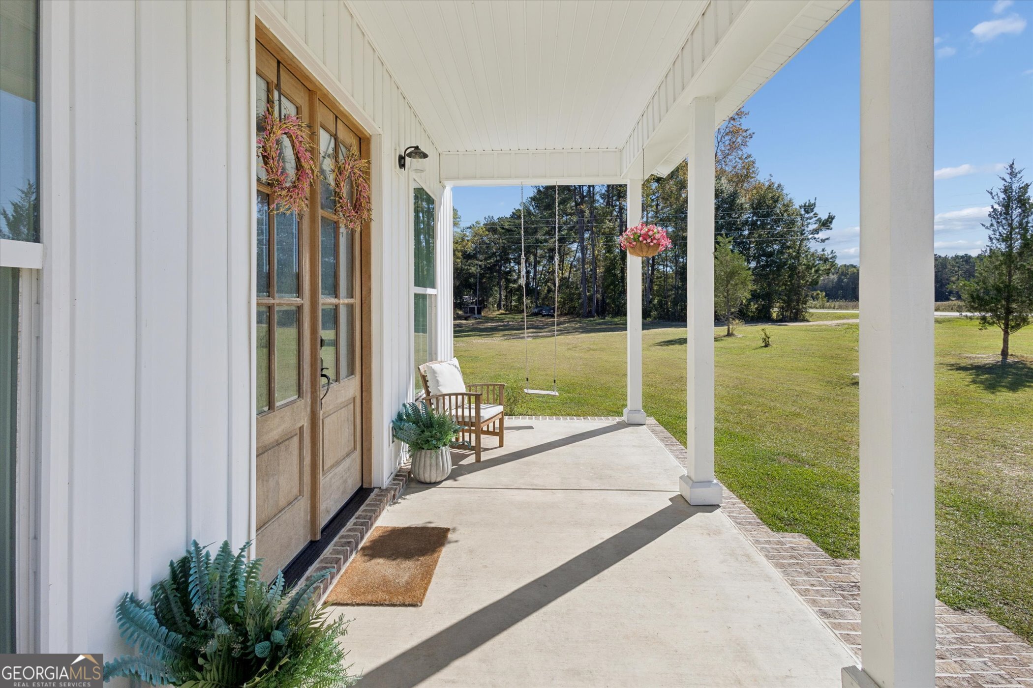 4031 Mud Road Brooklet, GA 30415 - Photo 6 of 49 a view of a porch