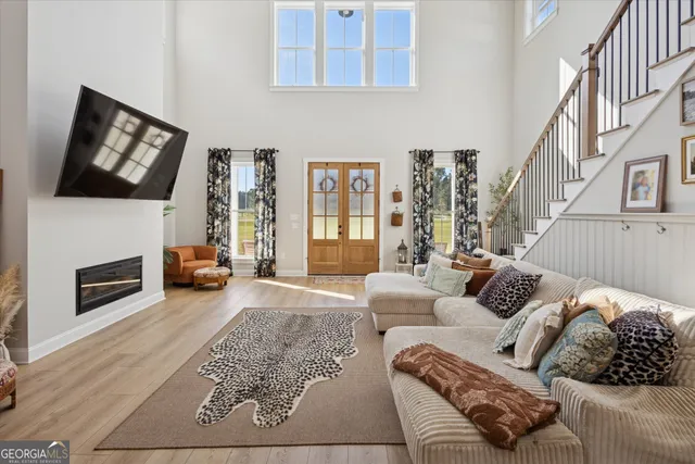 a living room with furniture or couch and a fireplace