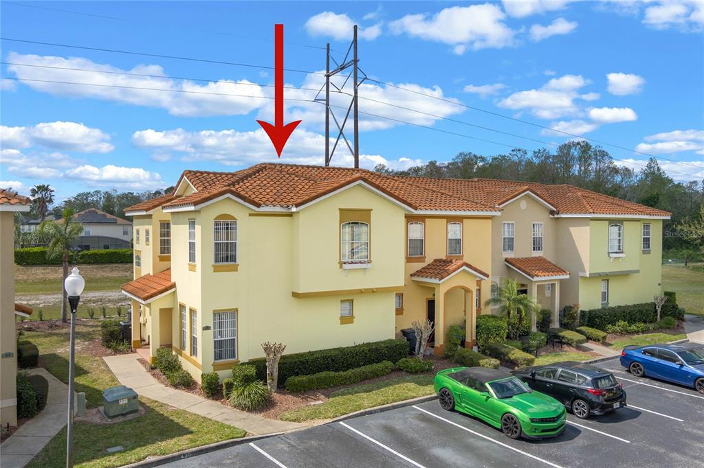 438 Monroe Circle Davenport, FL 33896 - Photo 1 of 1 a front view of a house with garden