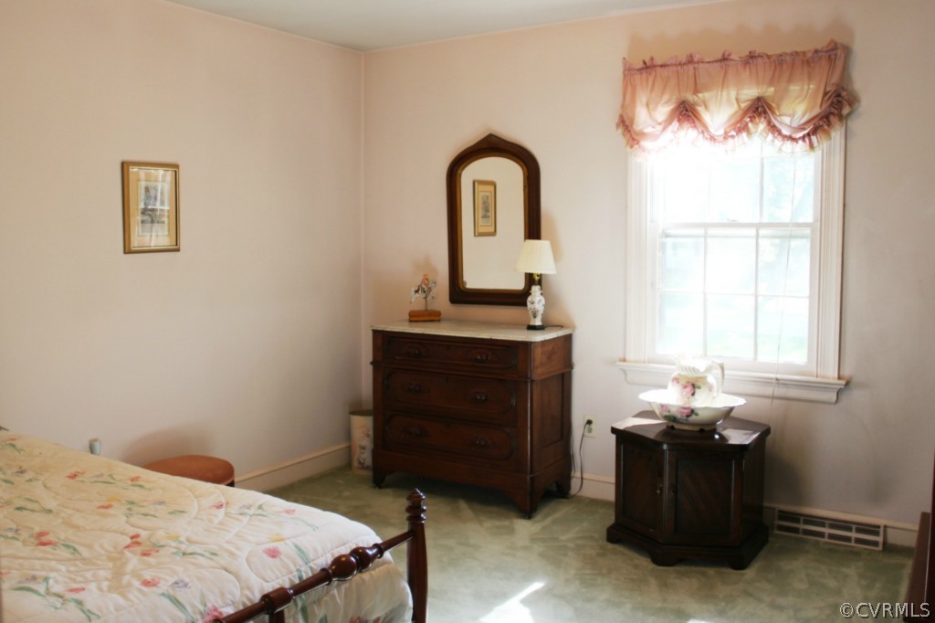 2630 Salisbury Road Midlothian, VA 23113 - Photo 14 of 19 a bedroom with a bed and a window