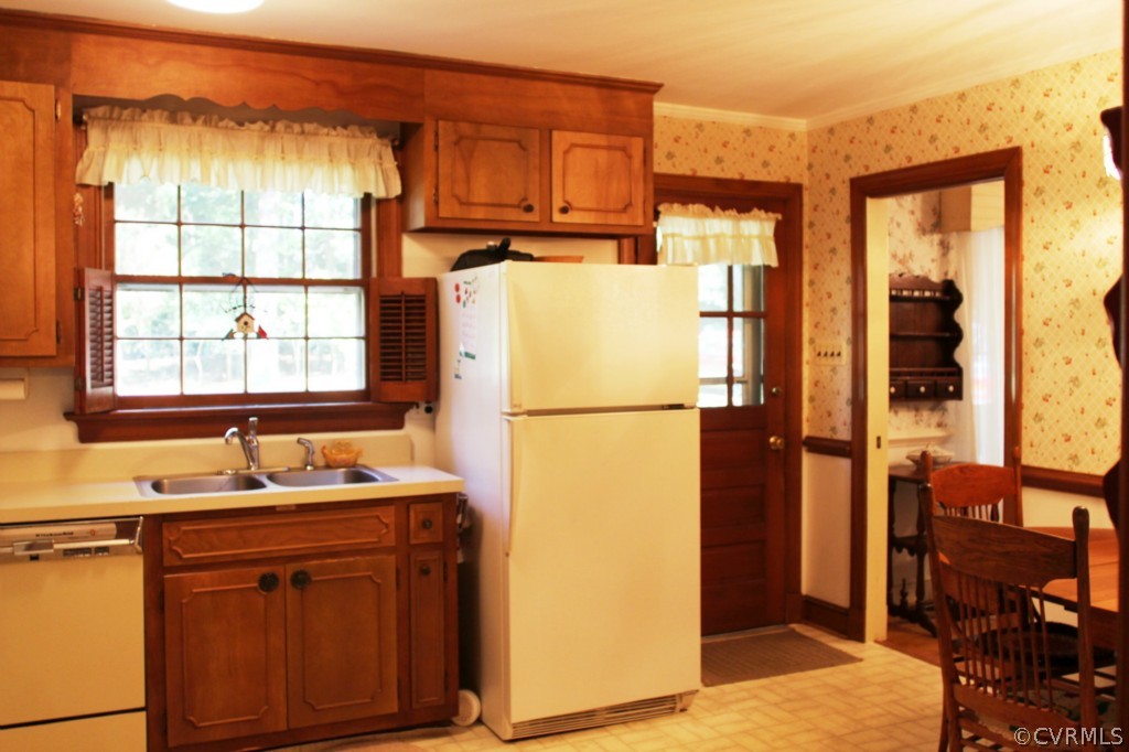 2630 Salisbury Road Midlothian, VA 23113 - Photo 8 of 19 a kitchen with sink refrigerator and cabinets