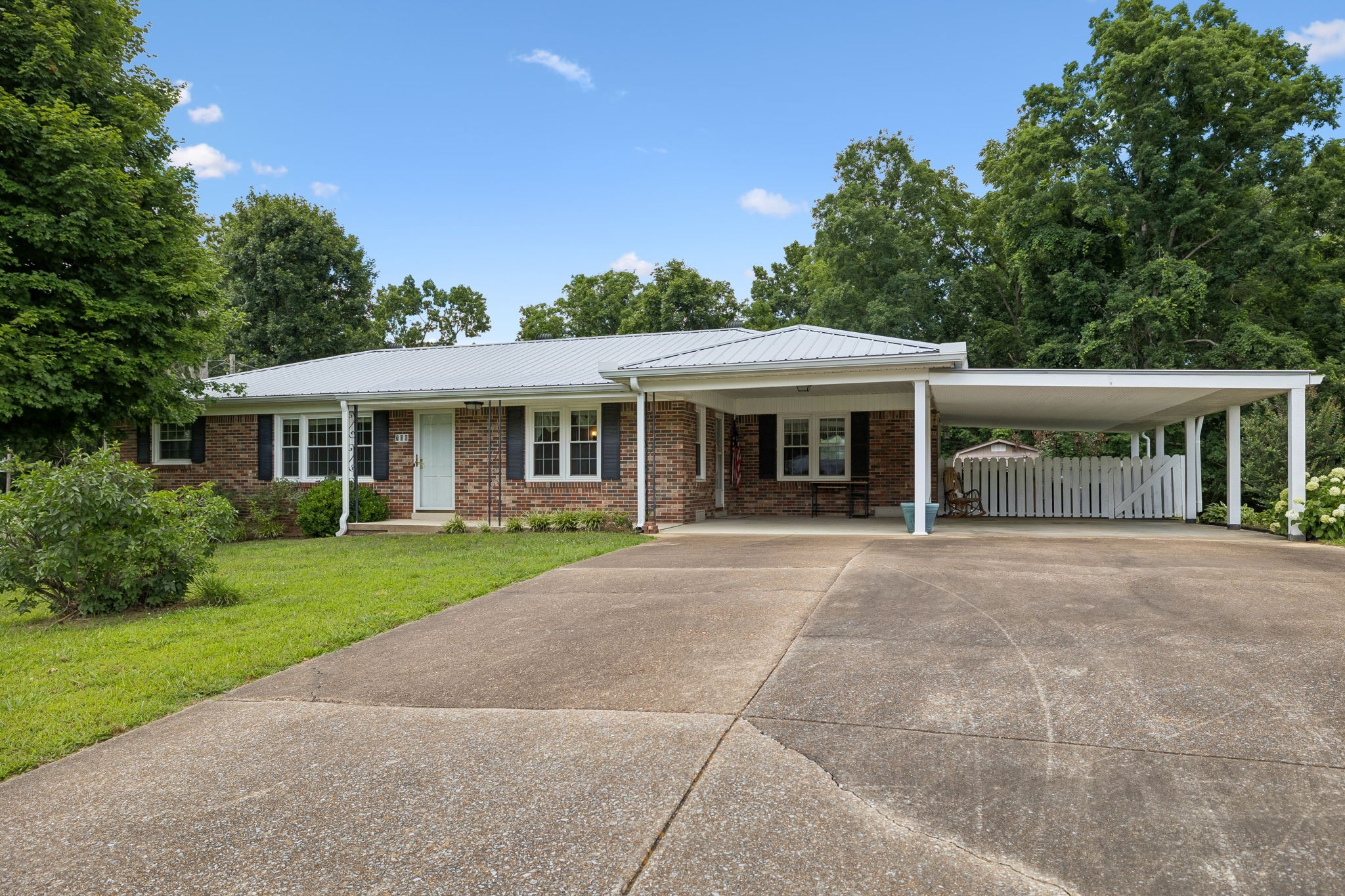 708 Hickory Street Centerville, TN 37033 - Photo 1 of 57 front view of a house with a yard