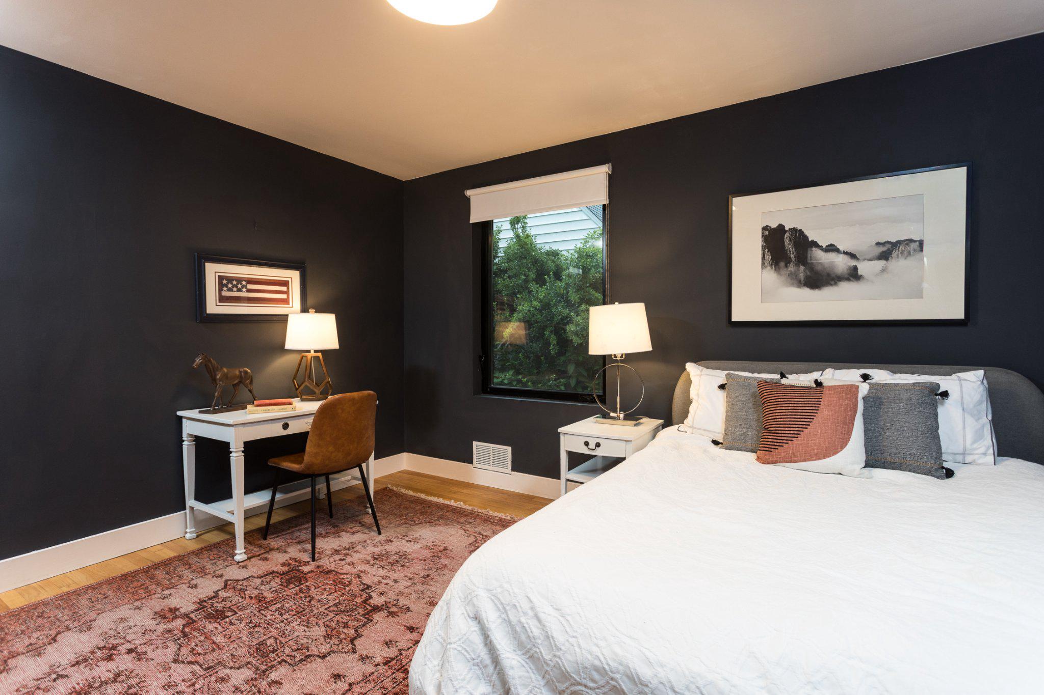 7006 Copeleigh Road Baltimore, MD 21212 - Photo 22 of 43 a bedroom with a bed and a desk