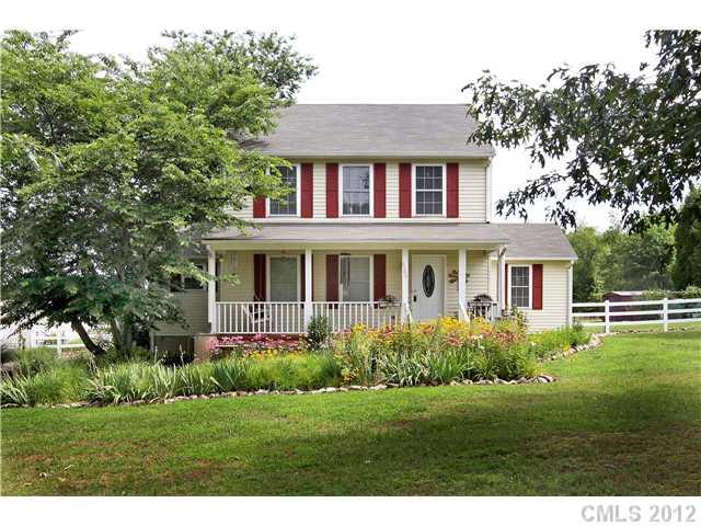 6200 Wright Road Kannapolis, NC 28081 - Photo 1 of 11 a front view of a house with a yard