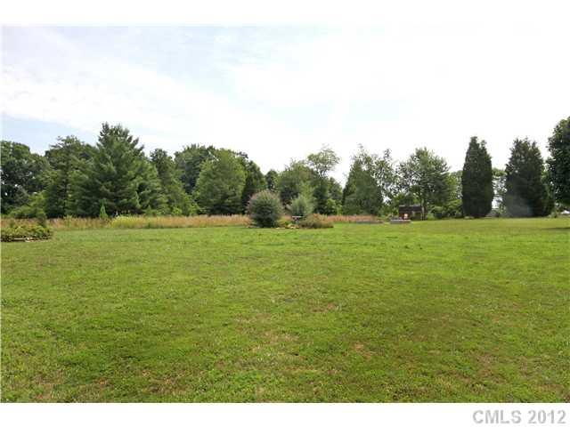 6200 Wright Road Kannapolis, NC 28081 - Photo 2 of 11 a view of a field with an trees