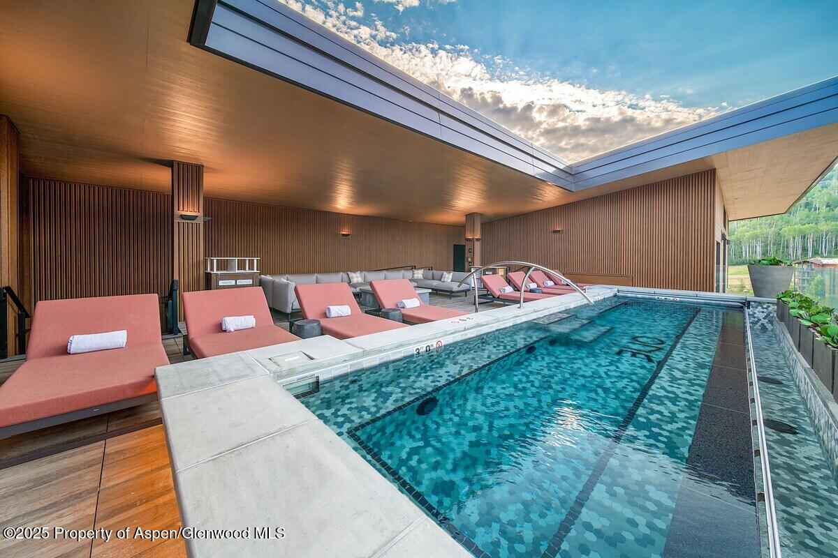 77 Wood Road, Unit 303 Snowmass Village, CO 81615 - Photo 37 of 43 a outdoor space with lots of white furniture