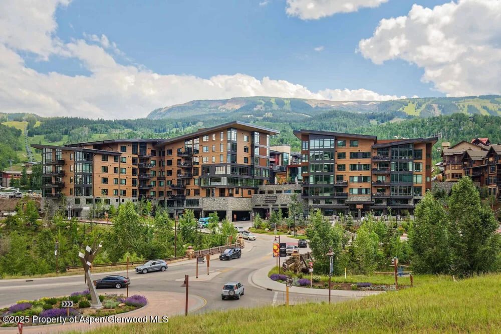 77 Wood Road, Unit 303 Snowmass Village, CO 81615 - Photo 41 of 43 a view of a city with tall buildings