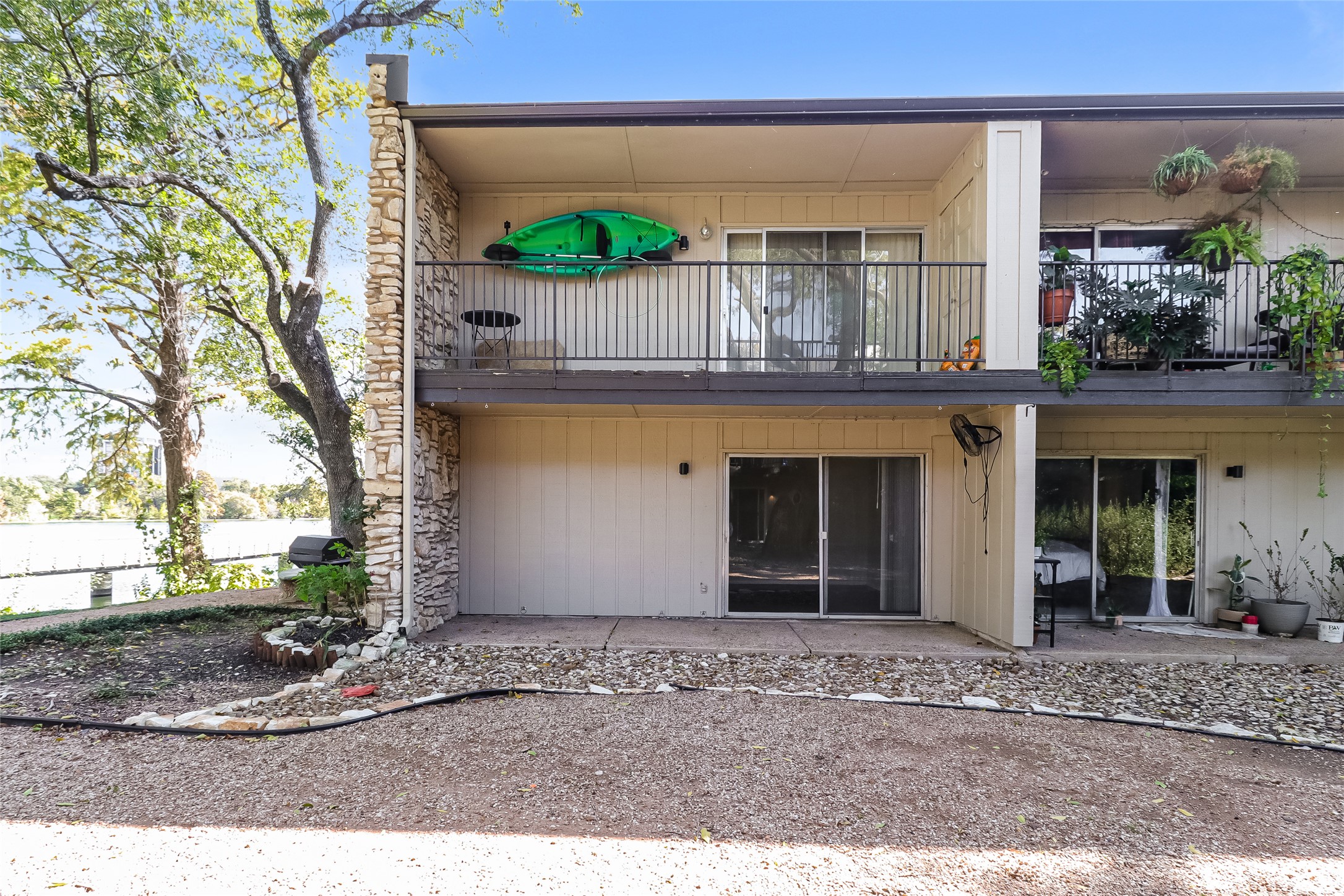 500 East Riverside Drive, Unit 135 Austin, TX 78704 - Photo 15 of 16 Rear view of house with a balcony and a patio area