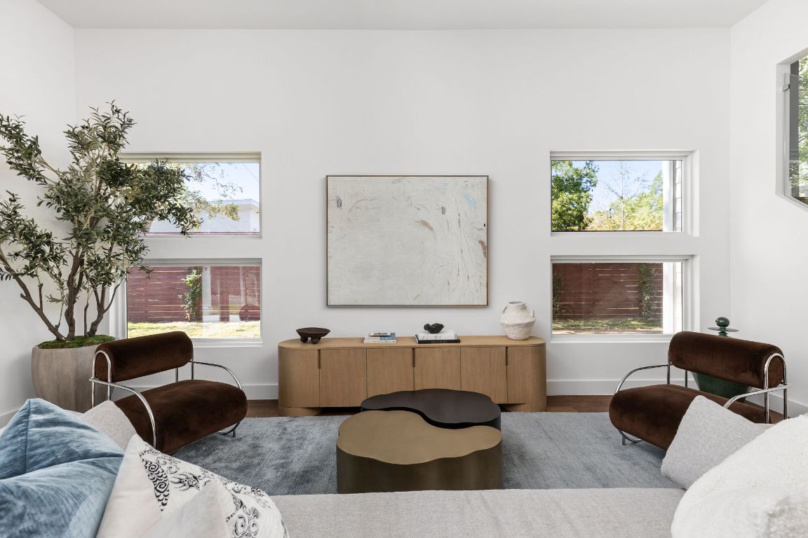 127 Frederick Street Austin, TX 78704 - Photo 12 of 35 a living room with furniture and a fireplace