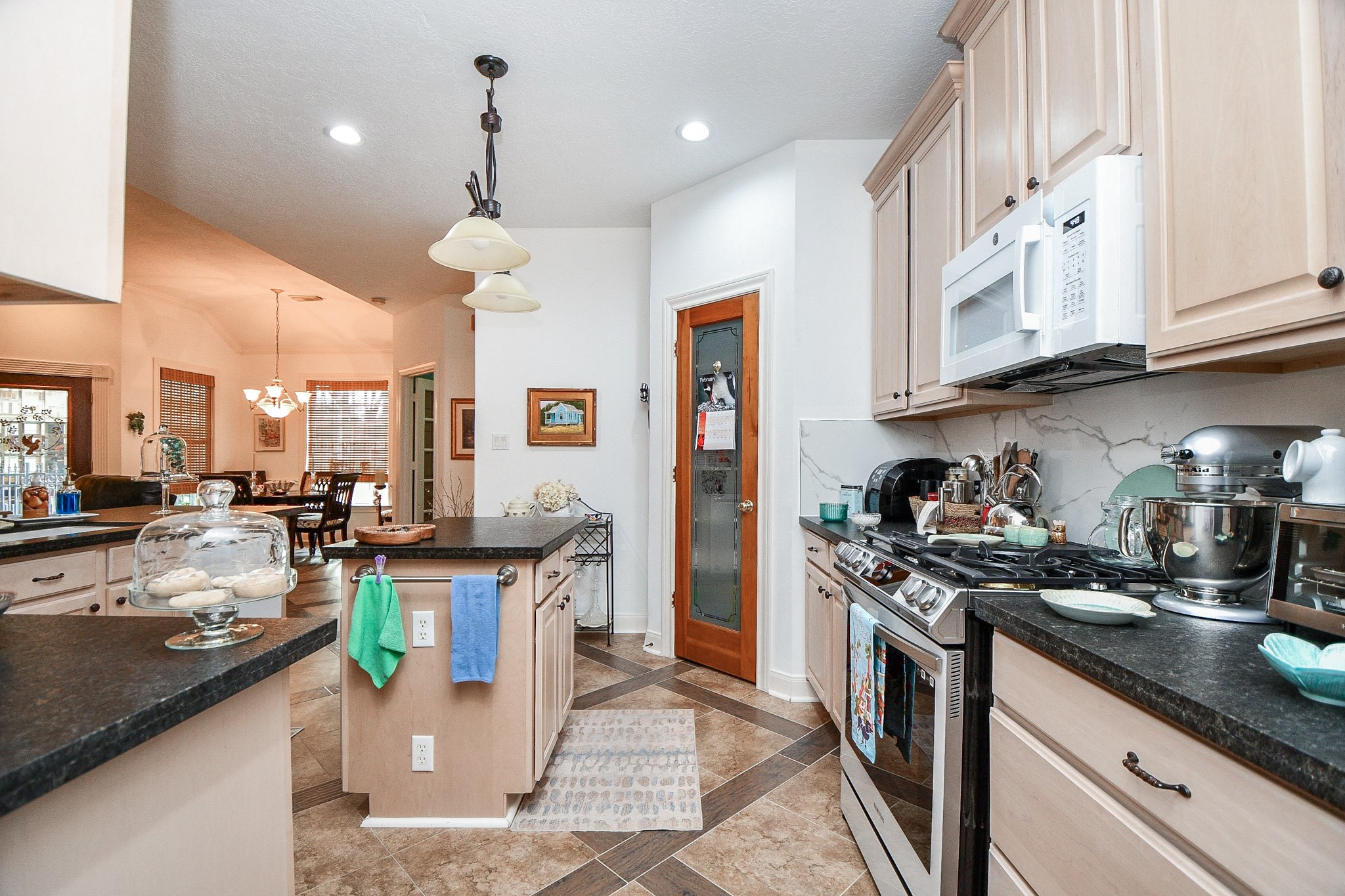 3680 Eula Morgan Road Katy, TX 77493 - Photo 44 of 50 Ample walking paths give you access to all cabinetry, counter space and appliances in this fabulous guest house.