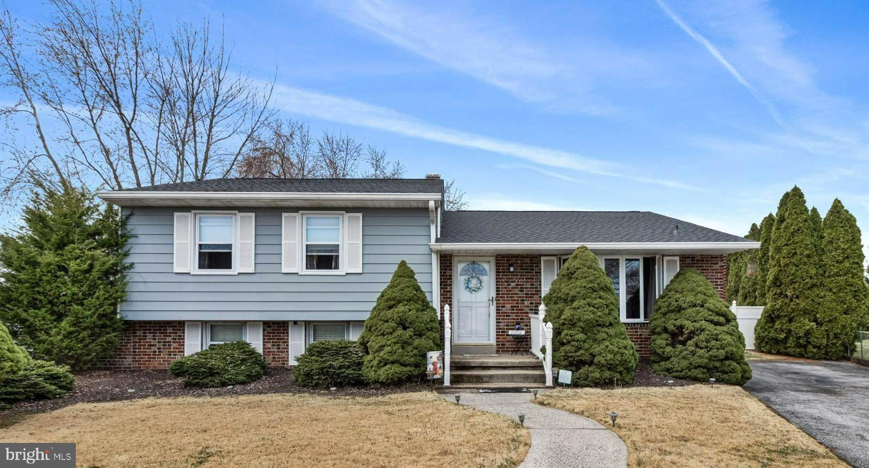 9202 Santa Rita Road Baltimore, MD 21236 - Photo 1 of 50 a front view of a house with garden