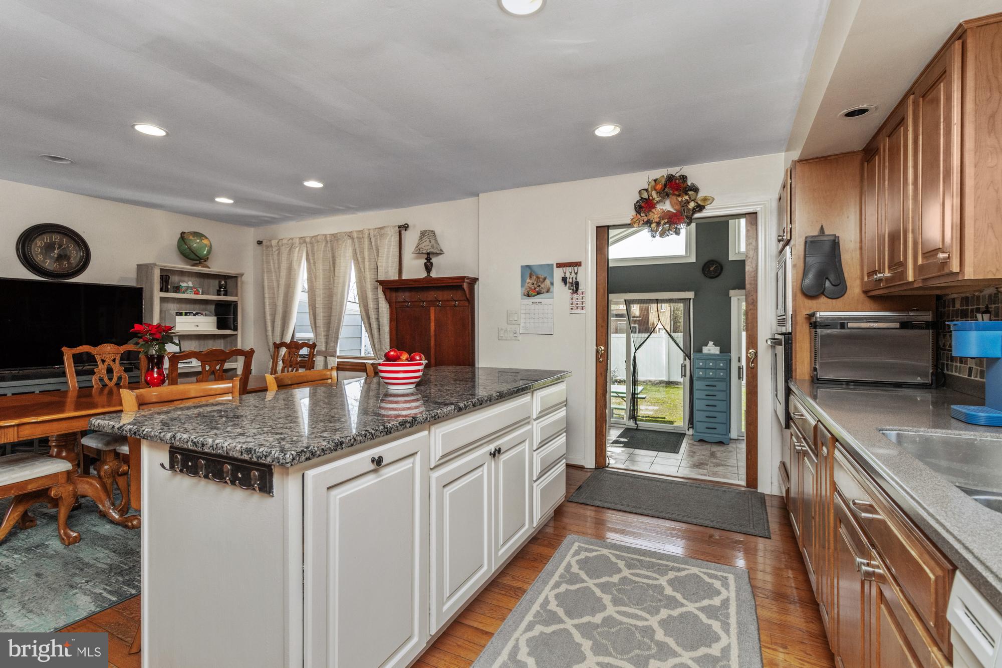 9202 Santa Rita Road Baltimore, MD 21236 - Photo 11 of 50 a kitchen with stainless steel appliances granite countertop a sink stove and refrigerator