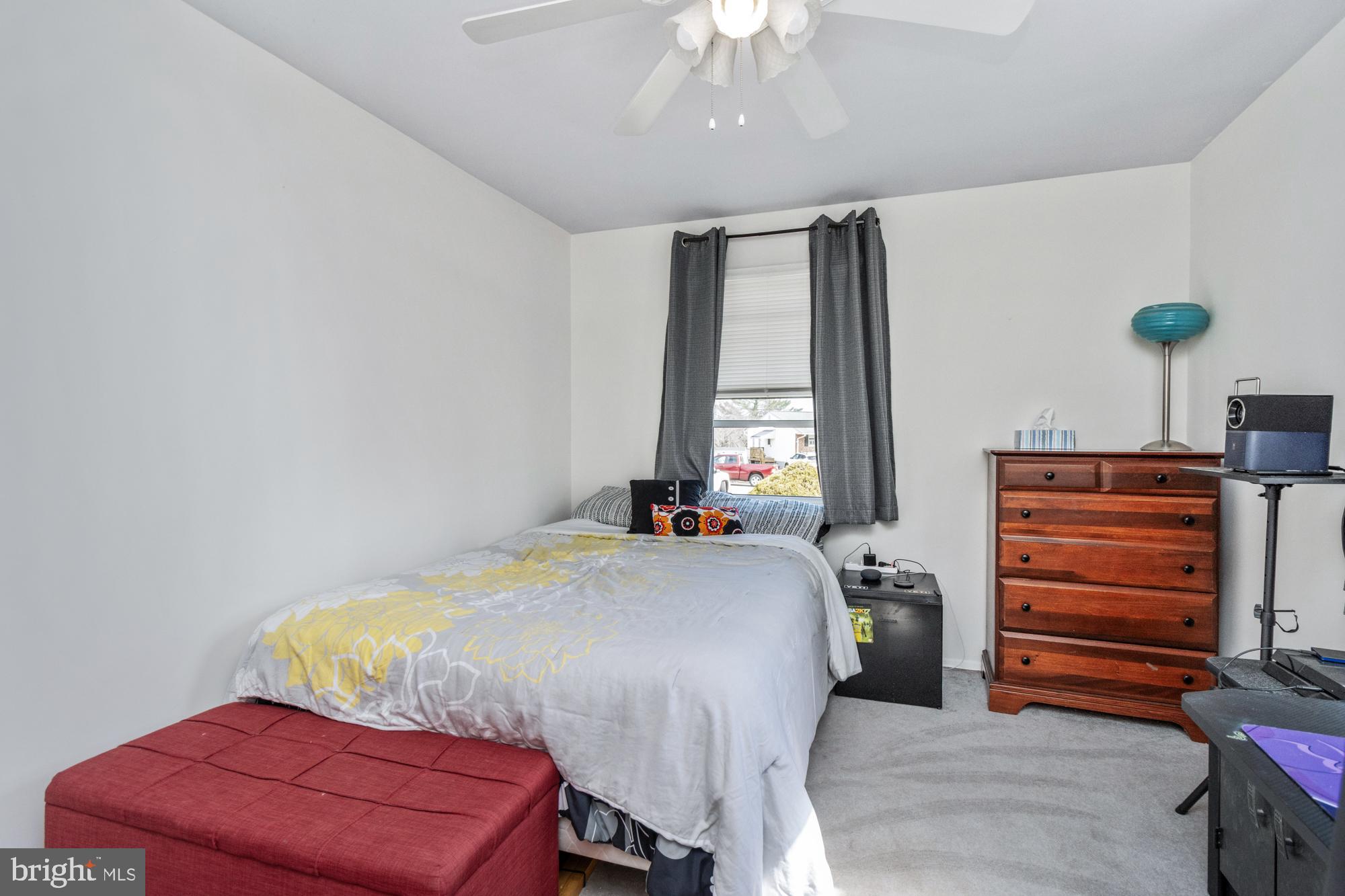 9202 Santa Rita Road Baltimore, MD 21236 - Photo 24 of 50 a bedroom with a bed and a window