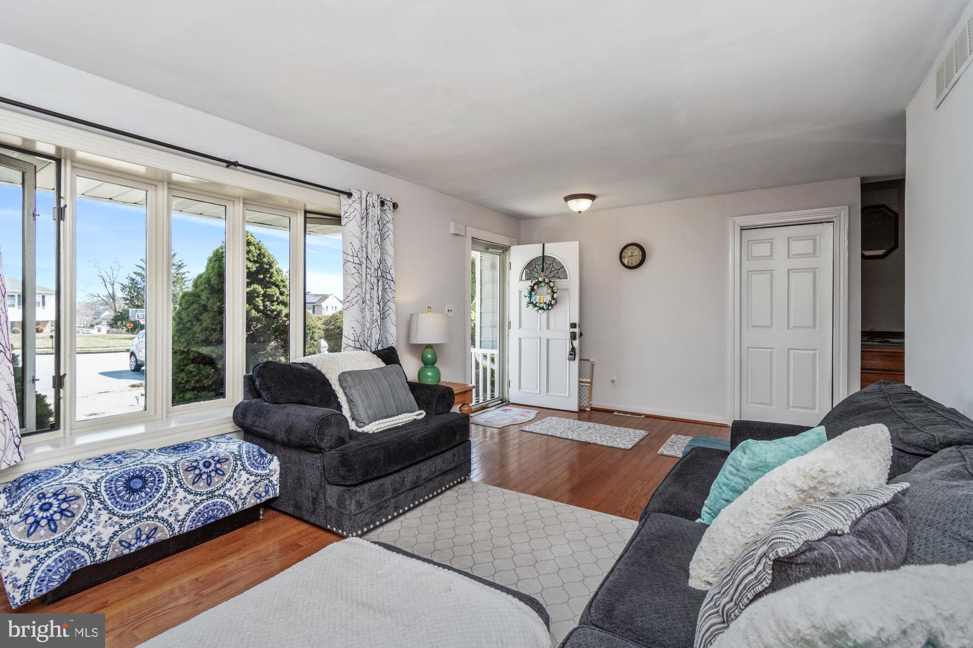 9202 Santa Rita Road Baltimore, MD 21236 - Photo 3 of 50 a living room with furniture and a large window