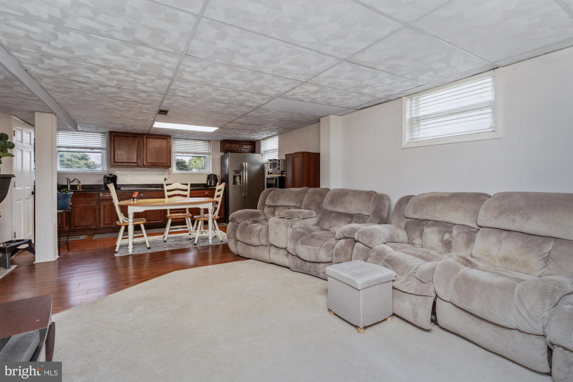 9202 Santa Rita Road Baltimore, MD 21236 - Photo 32 of 50 a living room with furniture and a wooden floor