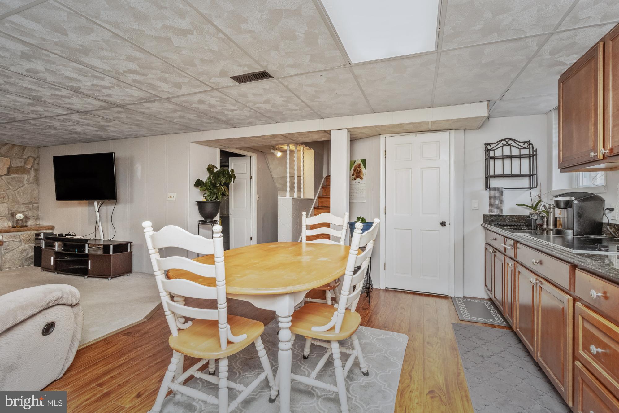 9202 Santa Rita Road Baltimore, MD 21236 - Photo 35 of 50 a view of a dining room with furniture