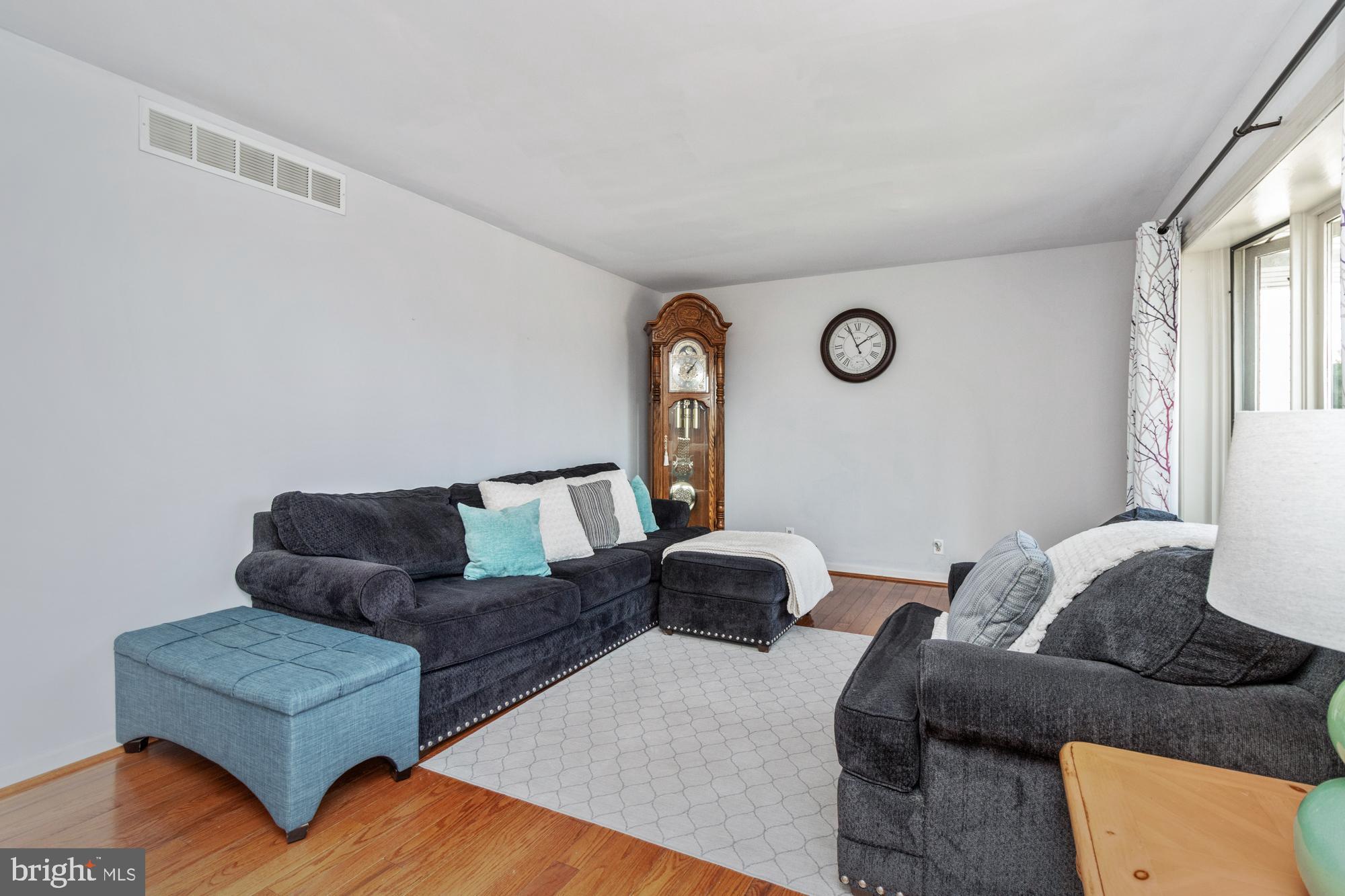 9202 Santa Rita Road Baltimore, MD 21236 - Photo 4 of 50 a living room with furniture and a window