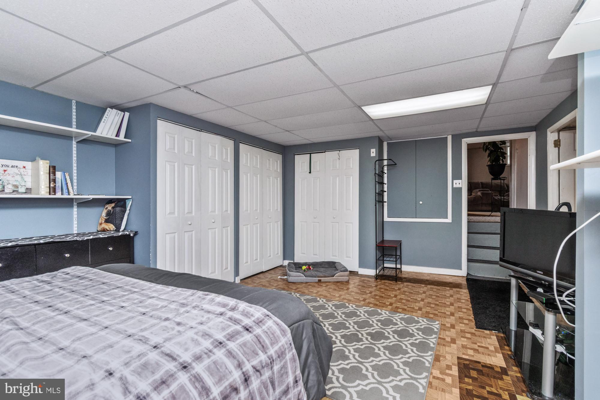 9202 Santa Rita Road Baltimore, MD 21236 - Photo 41 of 50 a bedroom with a bed and wooden floor