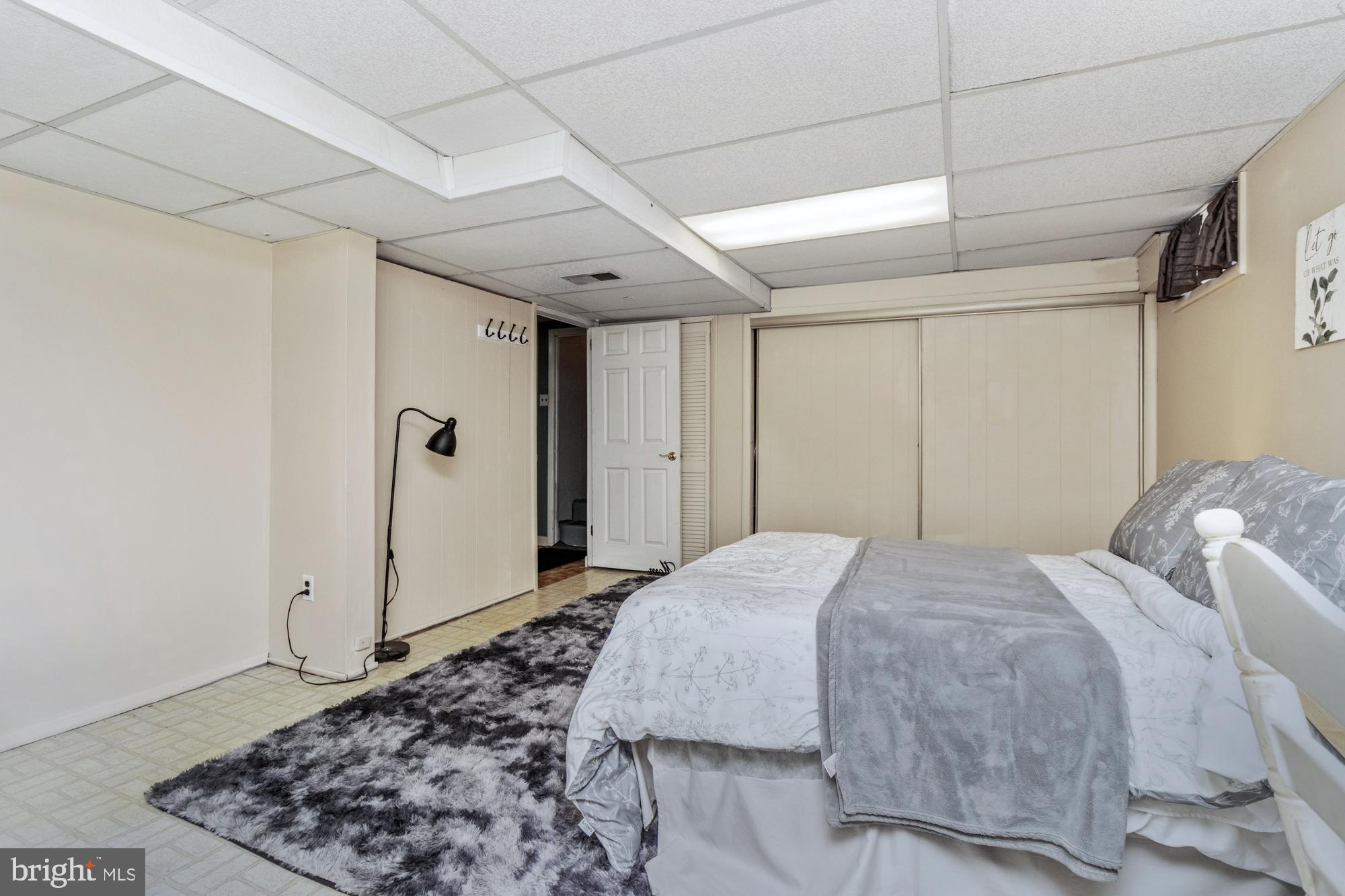 9202 Santa Rita Road Baltimore, MD 21236 - Photo 43 of 50 a bedroom with a large bed and a window